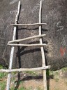 Ladder leaning against the rock