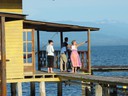 Lee showing a cabin to a new couple