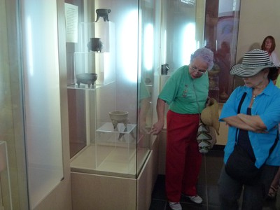 Dr. Graciela describes the different pottery styles and markings