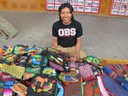 Kuna Indian selling handmade goods